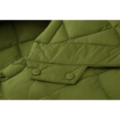 Cybex Snogga Mini 2 Nature Green Fußsack -Kinder Geschäft cyb 22 int deta snogga2line nagr buttons print medium 1